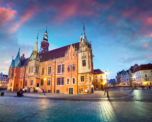 Naklejka na ściany i meble Colorful evening scene on Wroclaw Market Square with Town Hall.