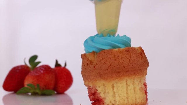 Strawberry cookie monster cupcake