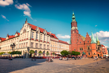 Colorful morning scene on Wroclaw Market Square with Town Hall.