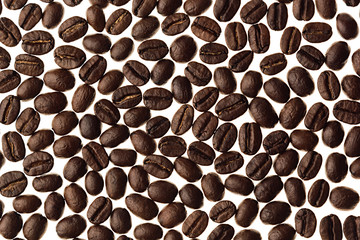 Roasted coffee beans pattern isolated on white background.