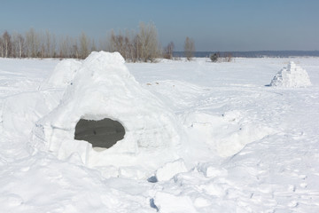 Igloo  on a snow glade in the winter