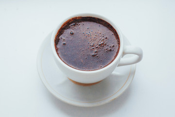 coffee cup over white background. The morning celebration