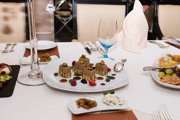 Appetizing food on a banquet table. Snacks