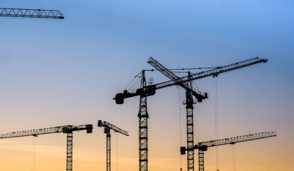 crains on a new construction site of high-rise building