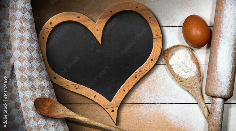 Aufkleber baking background with empty blackboard