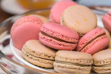 Gentle macaroons on table close-up