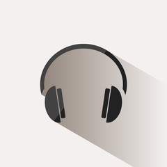 Headphones icon on a beige background with shade