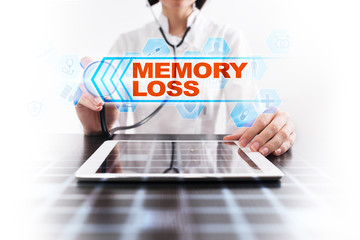 Medical doctor using tablet PC with memory loss medical concept.