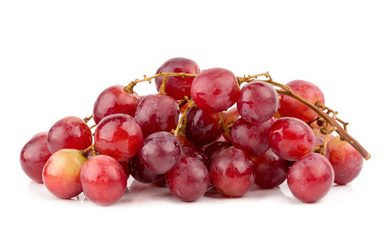 fresh and delicious red grapes isolated on white background
