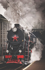 Old steam locomotive go to the route