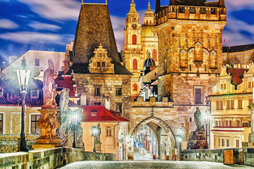 Prague, Charles bridge, tower, the Church of St. Nicholas, Czech Republic. Twilight scenery. Popular European travel destination. - obrazy, fototapety, plakaty