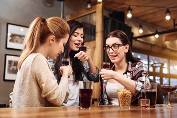 Company of three colleagues having rest
