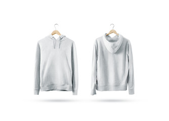 Blank white sweatshirt mockup set hanging on wooden hanger, front and back side view. Empty sweat shirt mock up on rack. Clear cotton hoody template. Plain textile hoodie. Loose overall jumper.