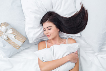 Obraz na płótnie Canvas Young Woman Sleeping Bed Concept