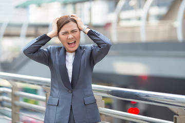 Businesswoman feel angry from work