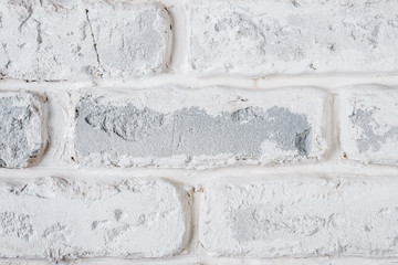 Abstract horizontal white background of a brick wall.