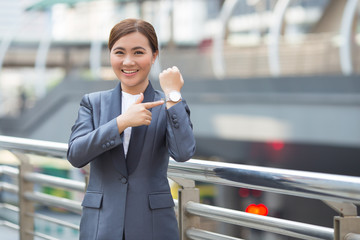 Happy woman has punctual