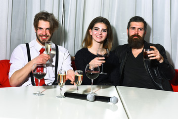 Friends celebrating at karaoke party