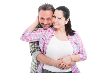 Naklejka premium Happy man embracing his beautiful girlfriend
