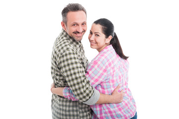 Happy young couple embracing and smiling