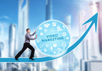 Technology, the Internet, business and network concept. A young businessman overcomes an obstacle to success: Video marketing
