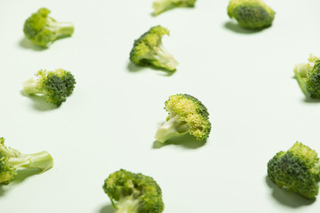 Modern style of the Broccoli isolated on green background.