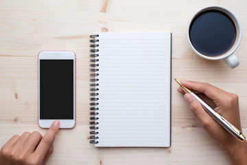 Digital tablet with blank screen and coffee