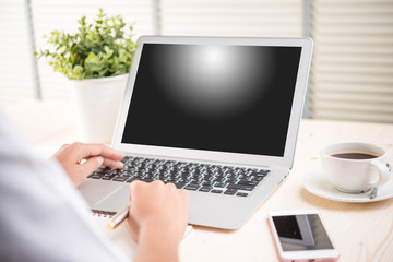 Fototapeta premium laptop with blank screen and coffee