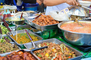 Street food market stalls near Central World mall in Bangkok, Thailand