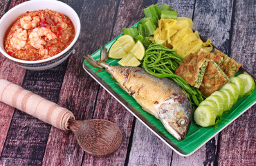 Fresh shrimp chili dip served with side dish.