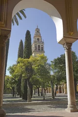 Fototapete Monument Courtyard and belfry of the mosque-cathedral of Cordoba. Located in the Spanish region of Andalusia, Its structure is regarded as one of the most accomplished monuments of Moorish architecture