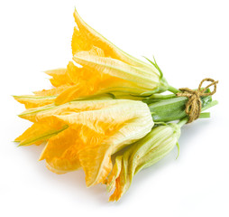 Fototapeta premium Zucchini flowers on a white background.