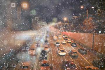jams in the city night winter snowfall background