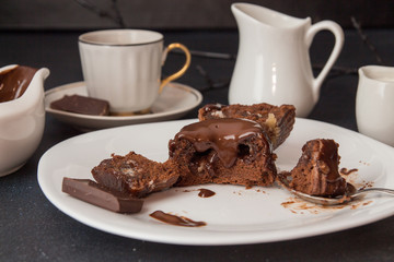 Chocolate french dessert cake mi-cuit on white plate