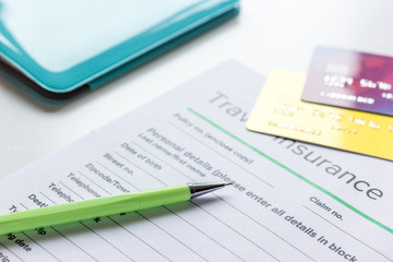 booking travel concept with insurance on table background