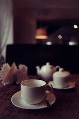 cup of tea or coffee in a cafe serving breakfast table