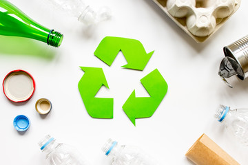 environment concept with recycling symbol on white background top view