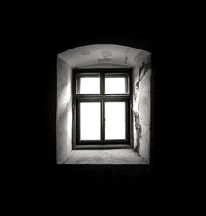 Vintage window in a dark room.