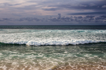 Ocean beach, waves for surfing. Indonesia the island of Bali.