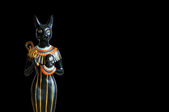 The Goddess Bastet - Role in ancient Egypt on black background.
Bastet was a goddess in ancient Egyptian religion.