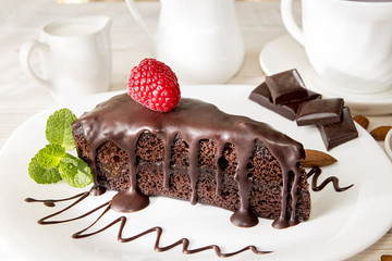 Piece of cake on white plate