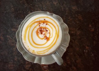 Top view of hot coffee cappuccino spiral foam 