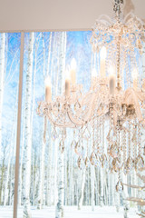 Glamorous New Year decor, chandelier, spruce