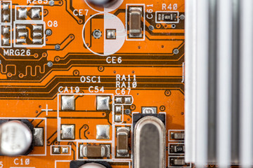 back side of a old red circuit board. close up.