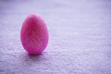 Colorful Easter Eggs on a fabric background. Creative concept
