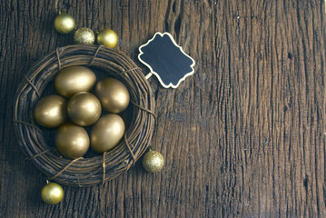 gold eggs with tag wood