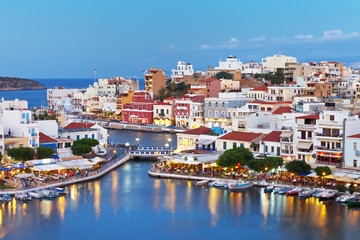Fototapeta na wymiar Beautiful southern town of Agios Nikolaos on a warm summer evening, Crete Island, Greece