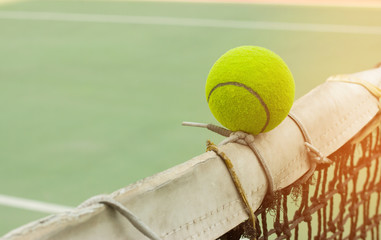 Tennis ball hitting the old net