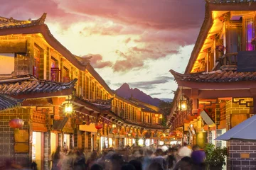 Tuinposter Lijiang old town in the evening with crowed tourist, Yunan ,China. © toa555