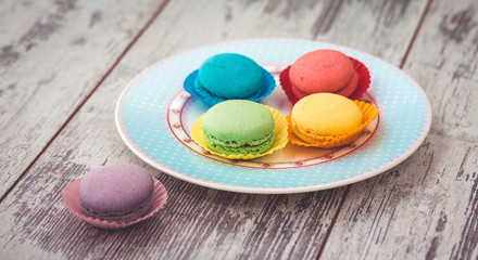 macaroons cookies on blue plate